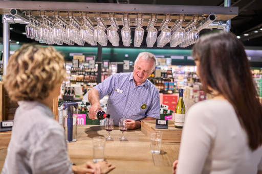 a woman having a drink with friends