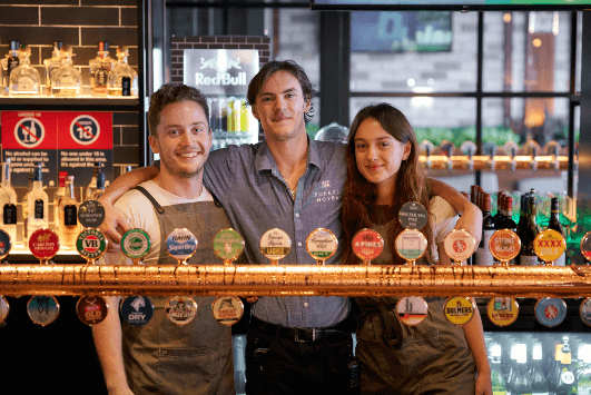 people cheersing with drinks