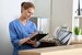 Nursing administrator holding folder with documents in hospital