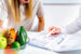 diet technician and female patient having a consultation in the office