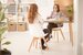 Dieitician with eating-disorder patient sitting at desk