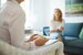 Counseling or therapy session with associate therapist and client in office or practice room