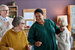 Diversity, inclusion and equity in senior living. Waist up portrait of black senior woman dancing with friends in retirement home and smiling joyfully