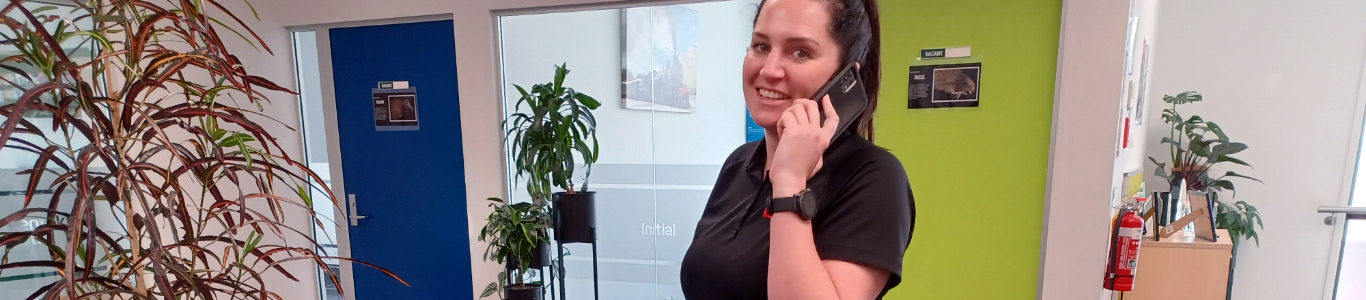 Woman talking on the phone in an office