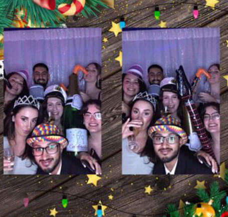 Graduates at the Christmas party photo booth