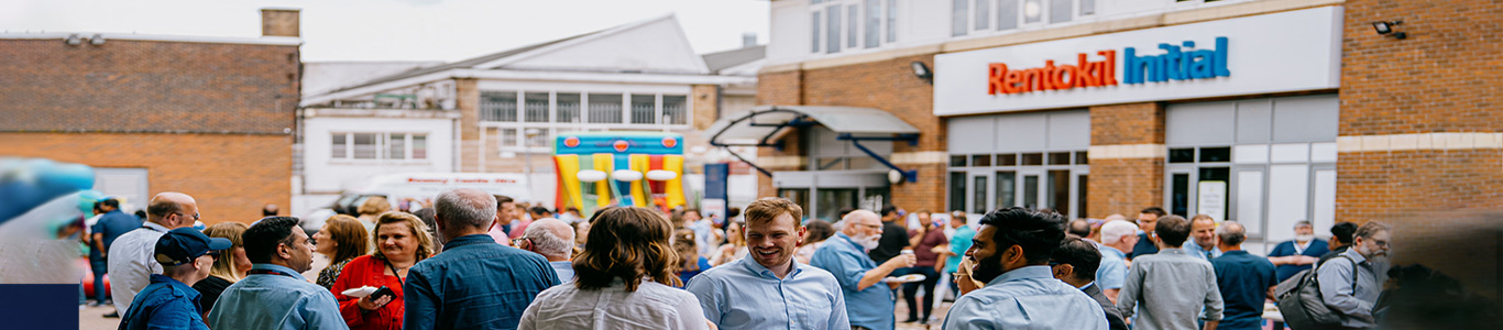 Rentokil Initial colleagues socialising outside of company headquarters