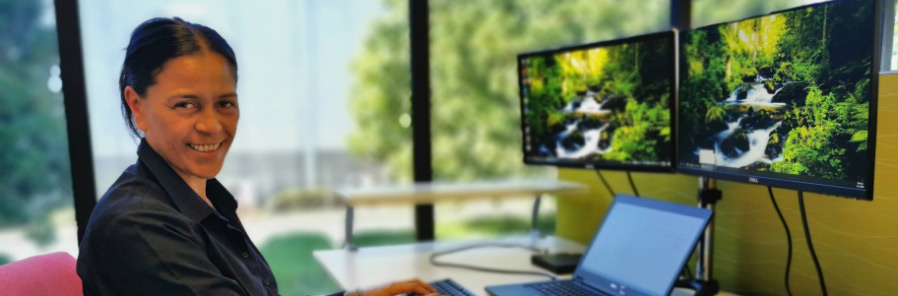 Colleague at her desk in the office