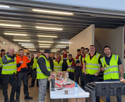 Colleagues socialising at a lunch at one of our sites