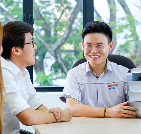 Rentokil Initial salesperson smiling at customer