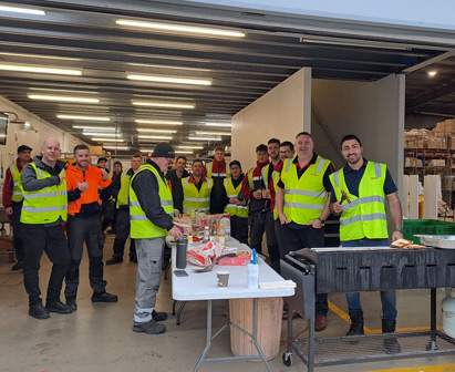 Colleagues socialising at a lunch at one of our sites