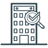 building with a magnifying glass icon