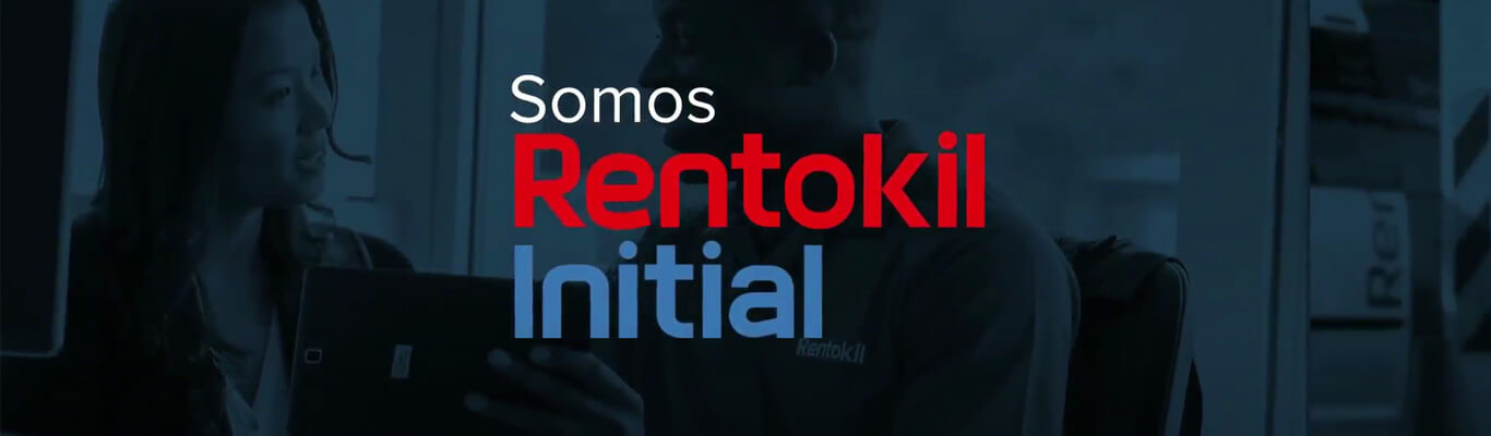 Somos Rentokil Initial; dos personas conversando en el fondo