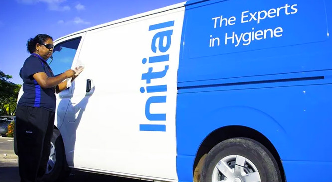Initial technician outside of a van