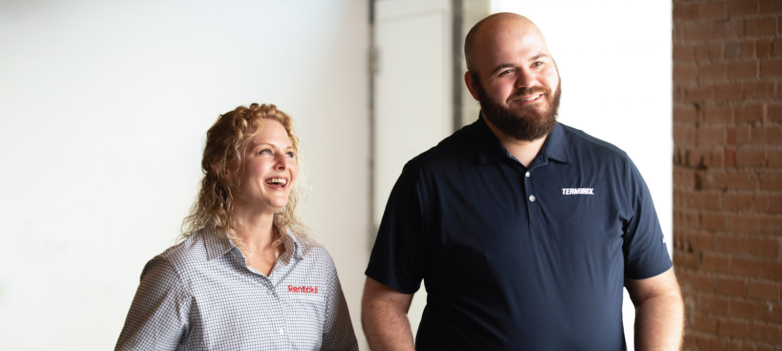 Terminix and Rentokil colleagues laughing
