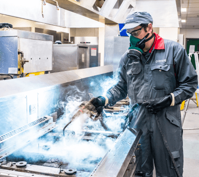 Rentokil Specialist Hygiene Technician doing a commercial kitchen deep cleaning