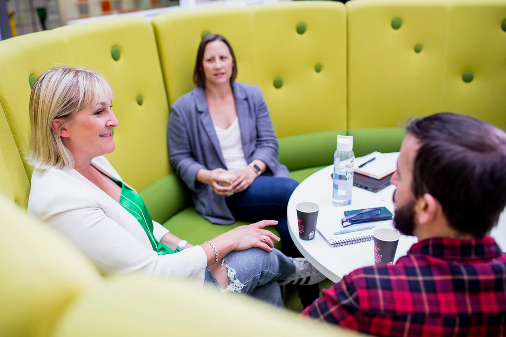 underwriting professionals in a meeting