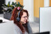 image of underwriter in a meeting virtually looking at computer 