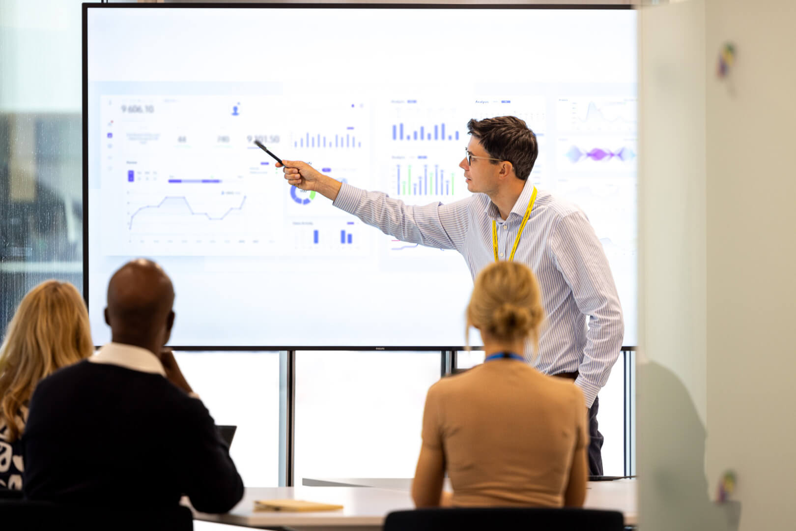 image of finance professional showcasing results to their team 