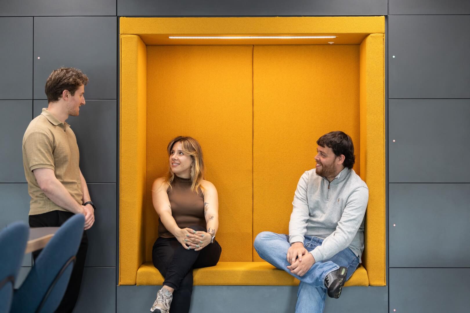 image of underwriters sitting and having a conversation at L&G office 