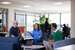 image of L&G colleagues at Brighton office sitting on sofas with laptops 
