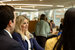 image of people sitting around table for a meeting 