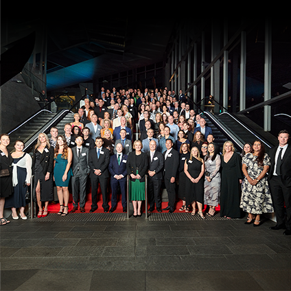 A group image of all the Qantas Group 2023 eXcel award winners at our Head Office in Mascot with Qantas CEO