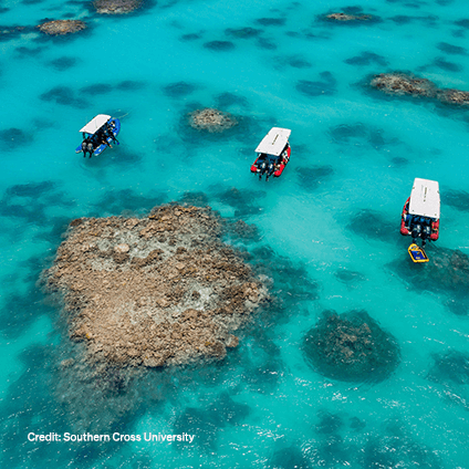 Beautiful blue water with several small boats