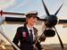 QantasLink pilot on airstairs, smiling