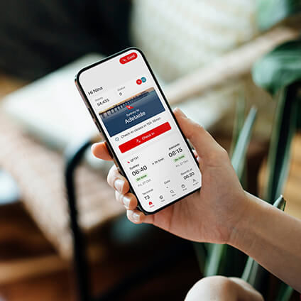 A phone depicting the Qantas app
