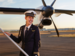 QantasLink pilot on airstairs, smiling