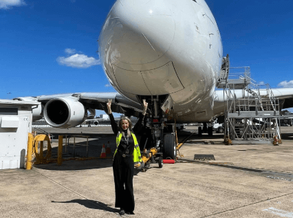 Qantas employee smiling at camera