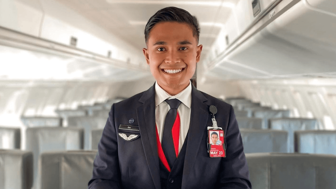 flight crew smiling as they leave the terminal