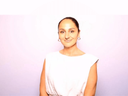 Qantas employee smiling at camera