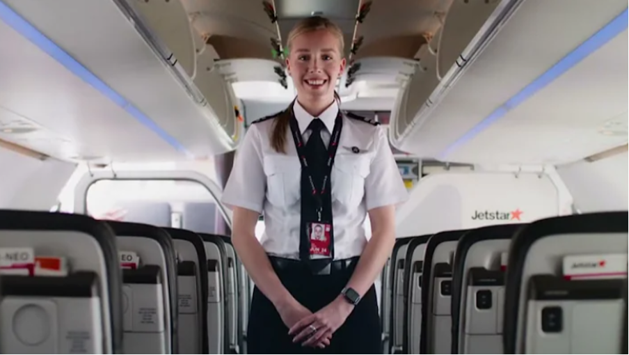 an image of staff smiling as they leave the terminal