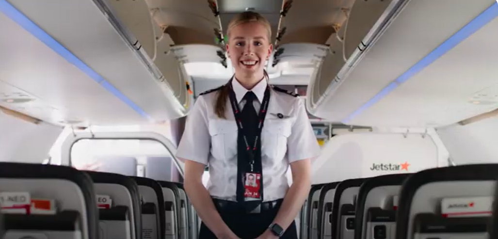 an image of staff smiling as they leave the terminal