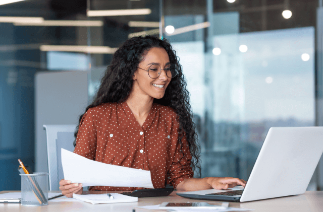 two colleagues having a conversation in a glass room