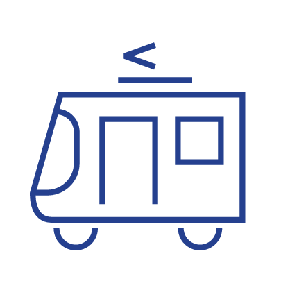 a headshot of a blonde woman in a blue suite jacket smiling at the camera