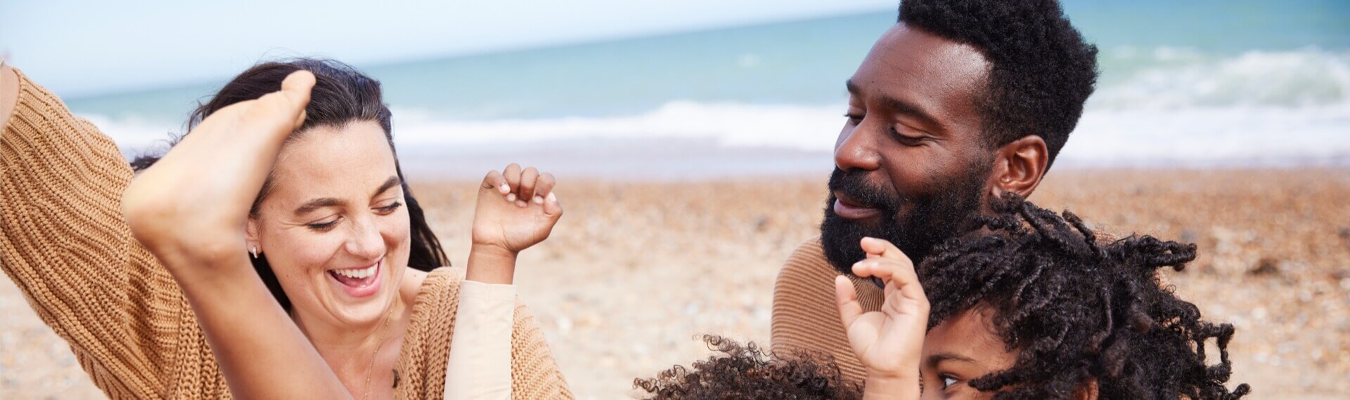 Image of a family at the beach 