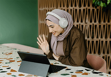 An image of a woman on a virtual meeting 