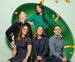 A group of specsavers employees surrounded by confetti