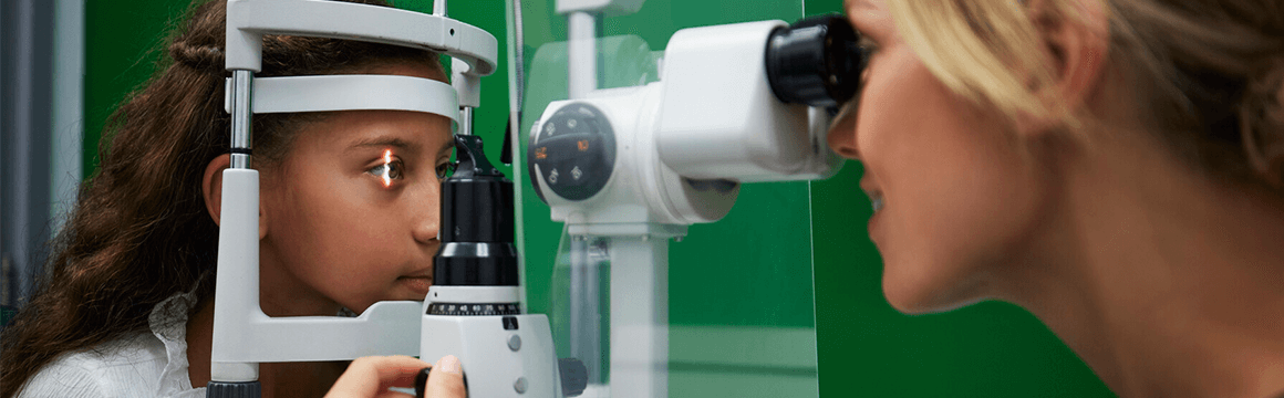 Child_sat_having_an_eye_test