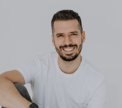 a woman staring at a computer screen