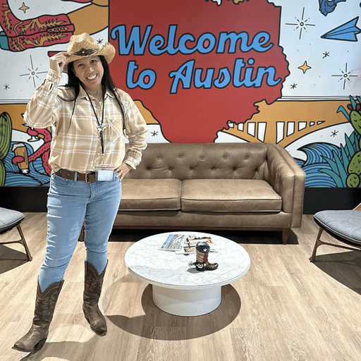 a woman staring at a computer screen