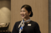 image of Australian staff member smiling in the reception 