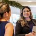 food and beverage manager at accor smiling holding ipad and giving directions