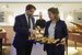 image of food and beverage managers holding tray of food