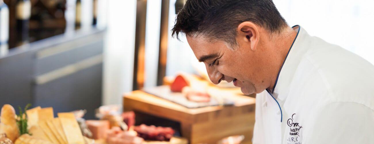 image of chef cutting food