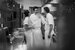image of three chefs at accor talking to each other in the kitchen 