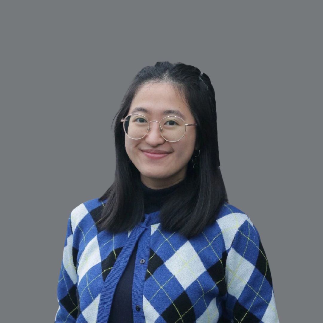 a image of the author smiling
