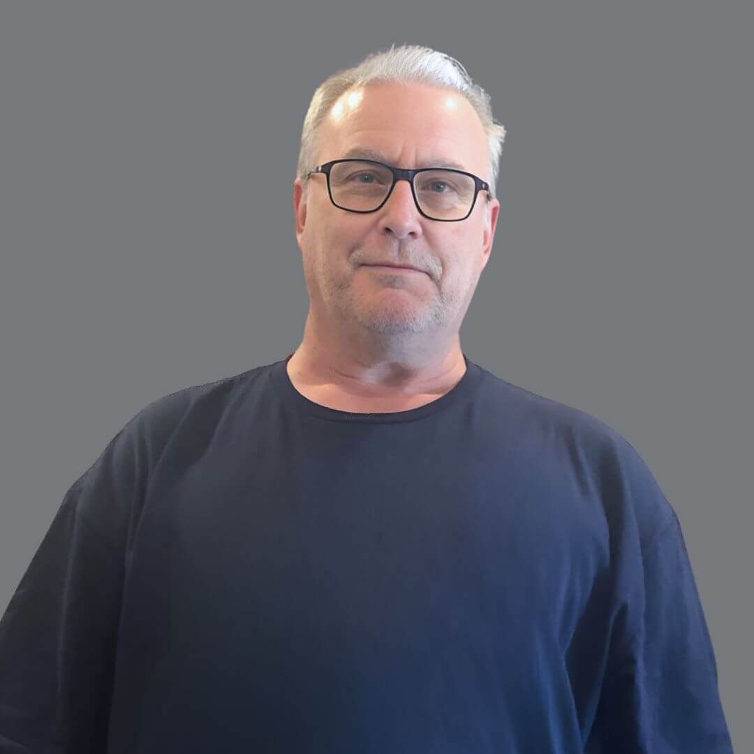 a image of the author smiling
